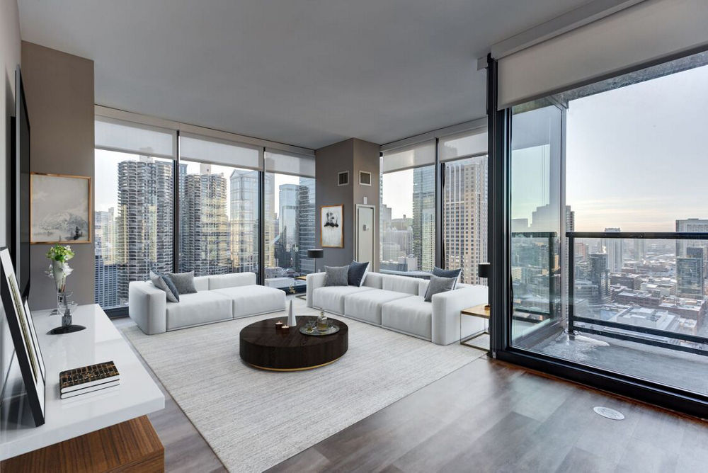 State and Grand Living Room Overlooking City | Blog | Greystar